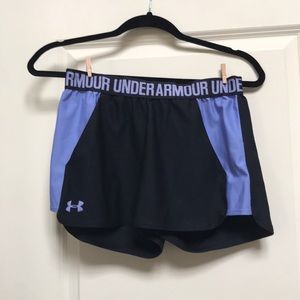 Purple and black under armour running shorts